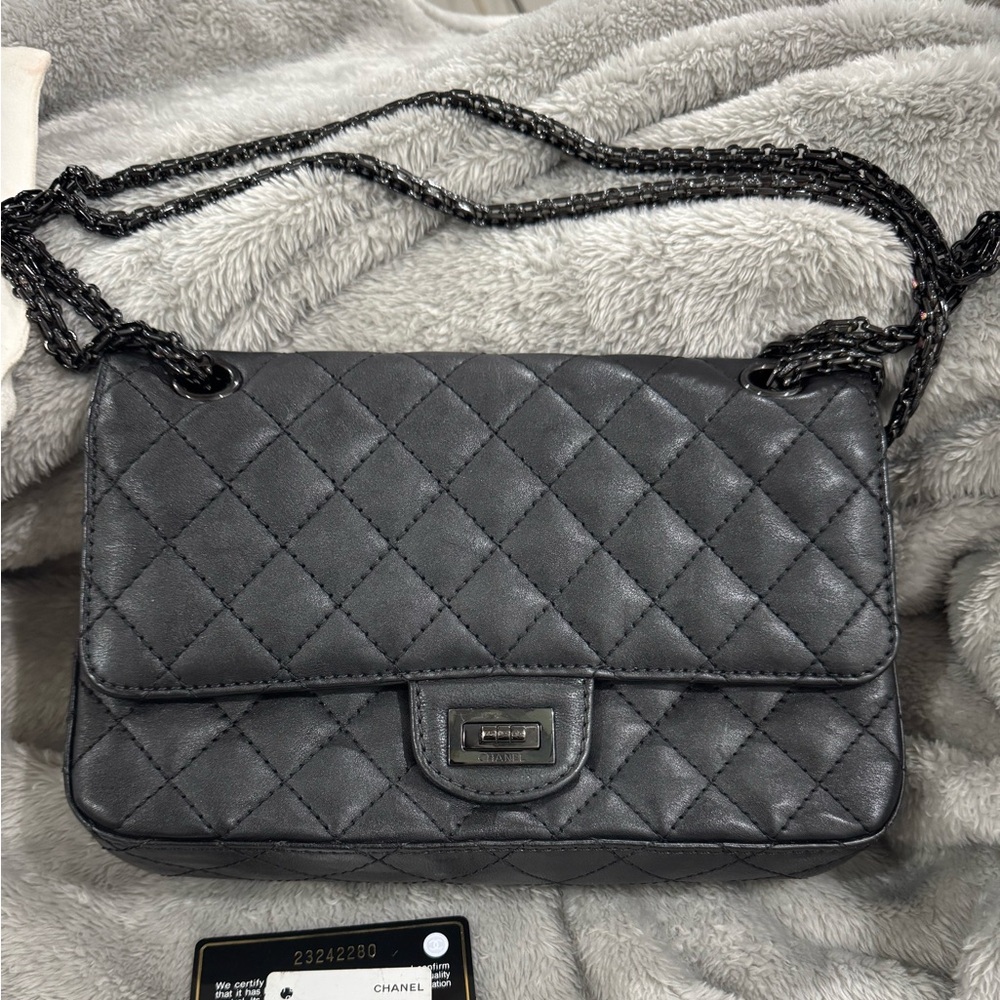 Chanel Medium a classic Flap bag 
All blacked out